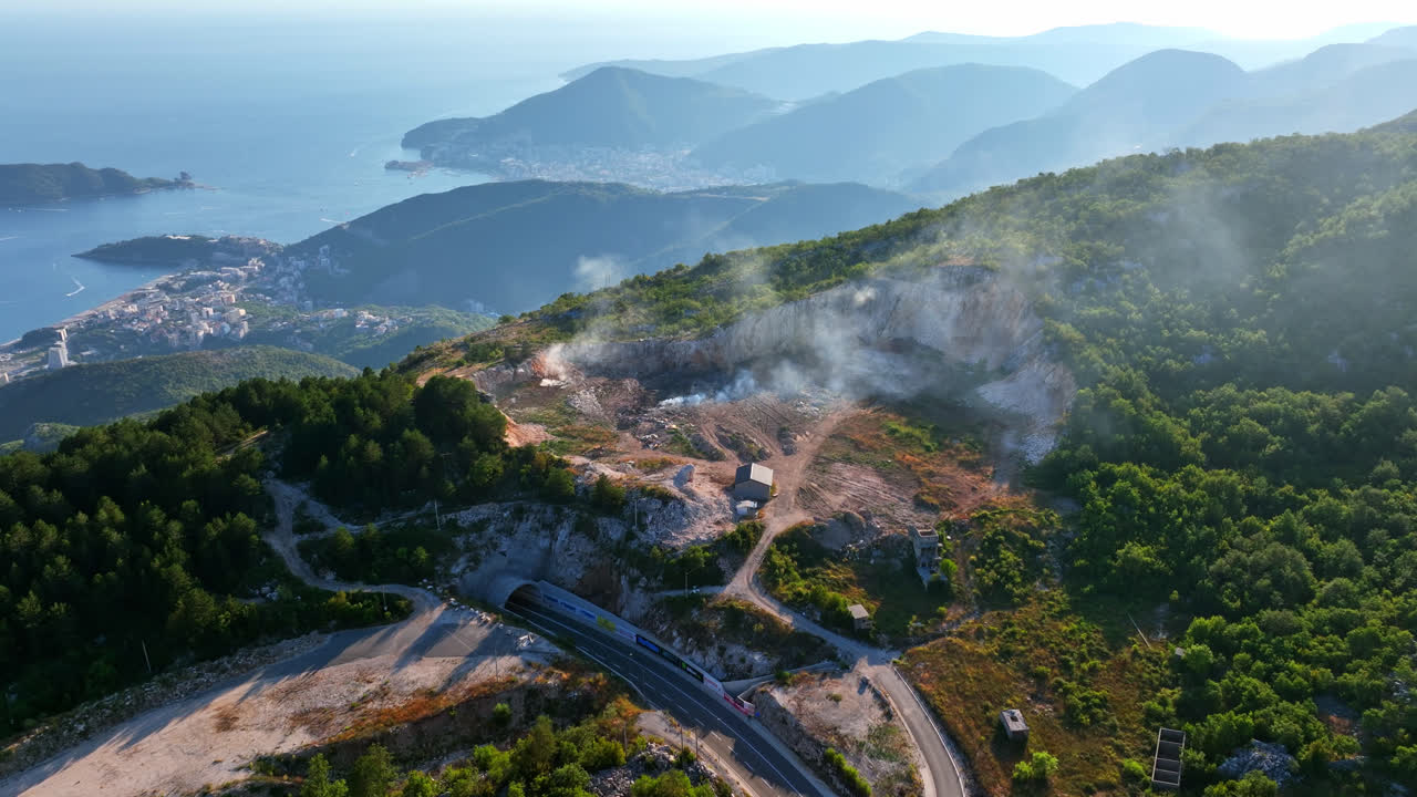 Aerial tracking shot of nature burning in the highlands of Budva, Montenegro