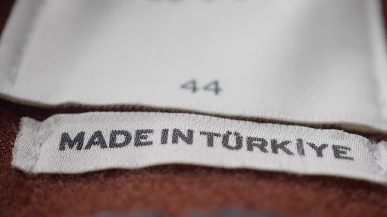 Close-up of Clothing Tag with 'Made in Turkey' and Size 44