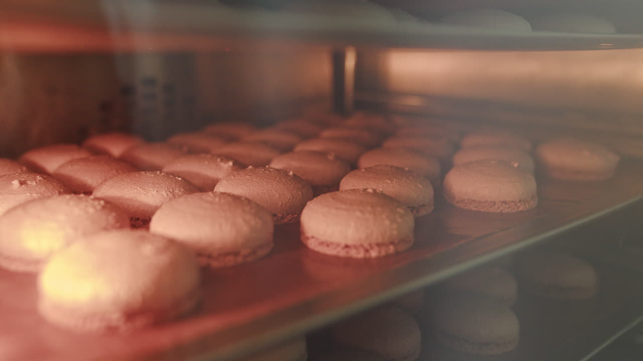 Macarons baking in an oven