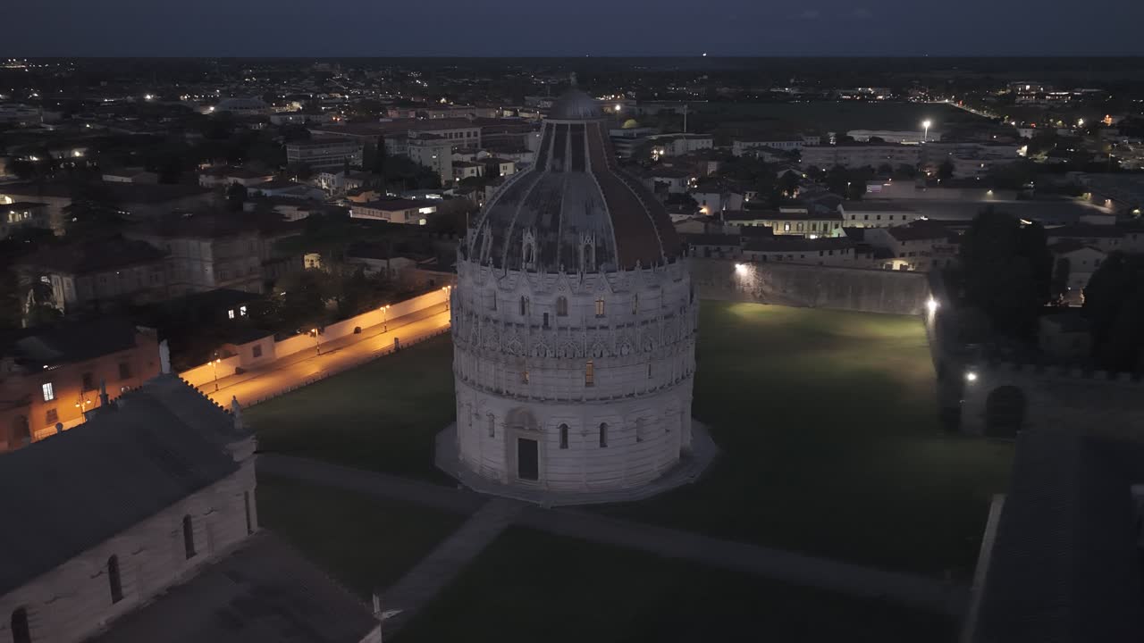Cinematic sunrise drone footage of the Leaning Tower of Pisa and the Piazza dei Miracoli, captured with smooth aerial movements and soft early morning light