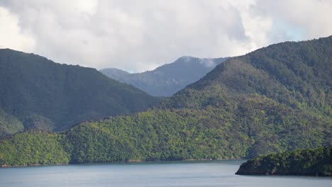 Time-lapse-of-Torea-bay-and-Allports-island-near-Picton,-New-Zealand-on-a-breezy-spring-morning