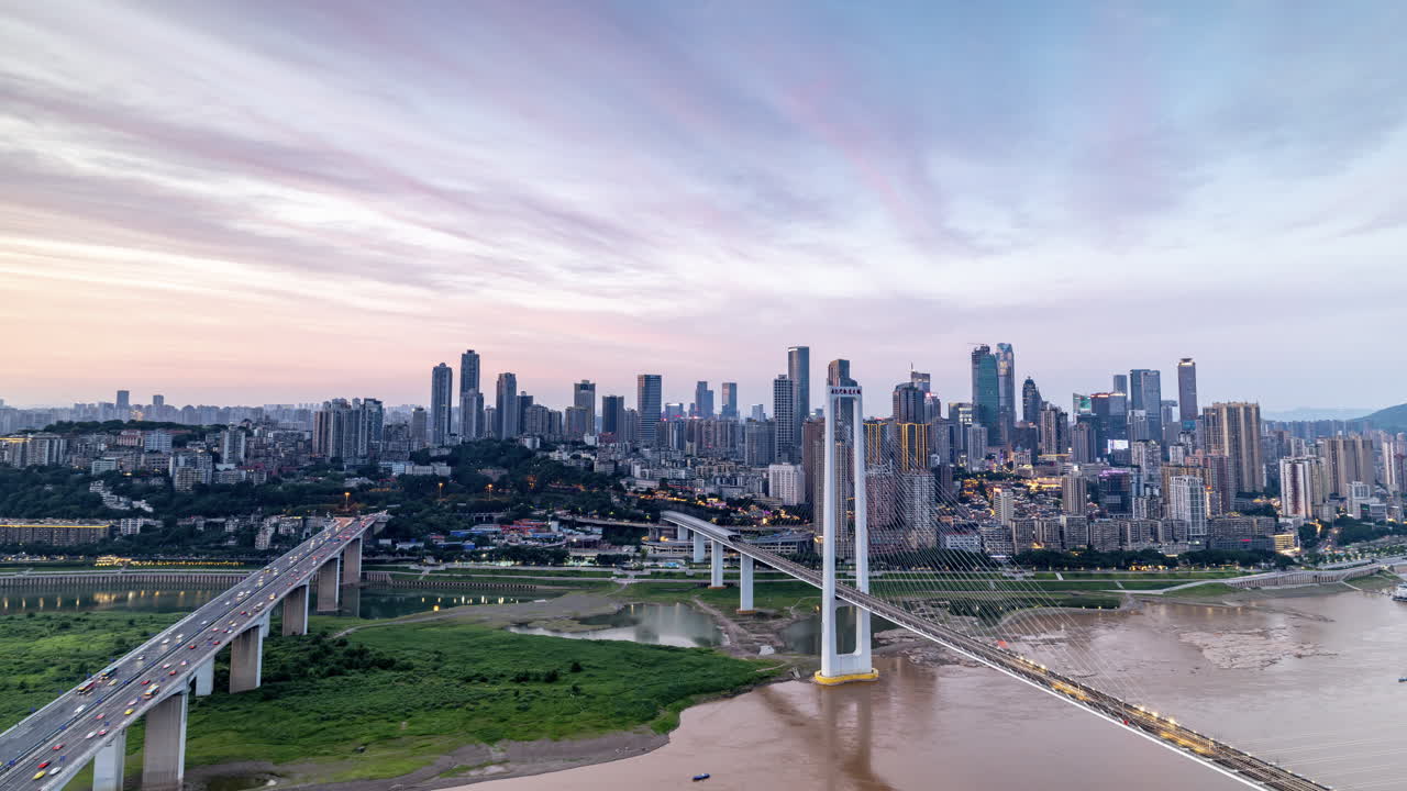 Timelapse of the amazing Chongqing cyberpunk city skyline from a high vantage point wirh the yangtze river