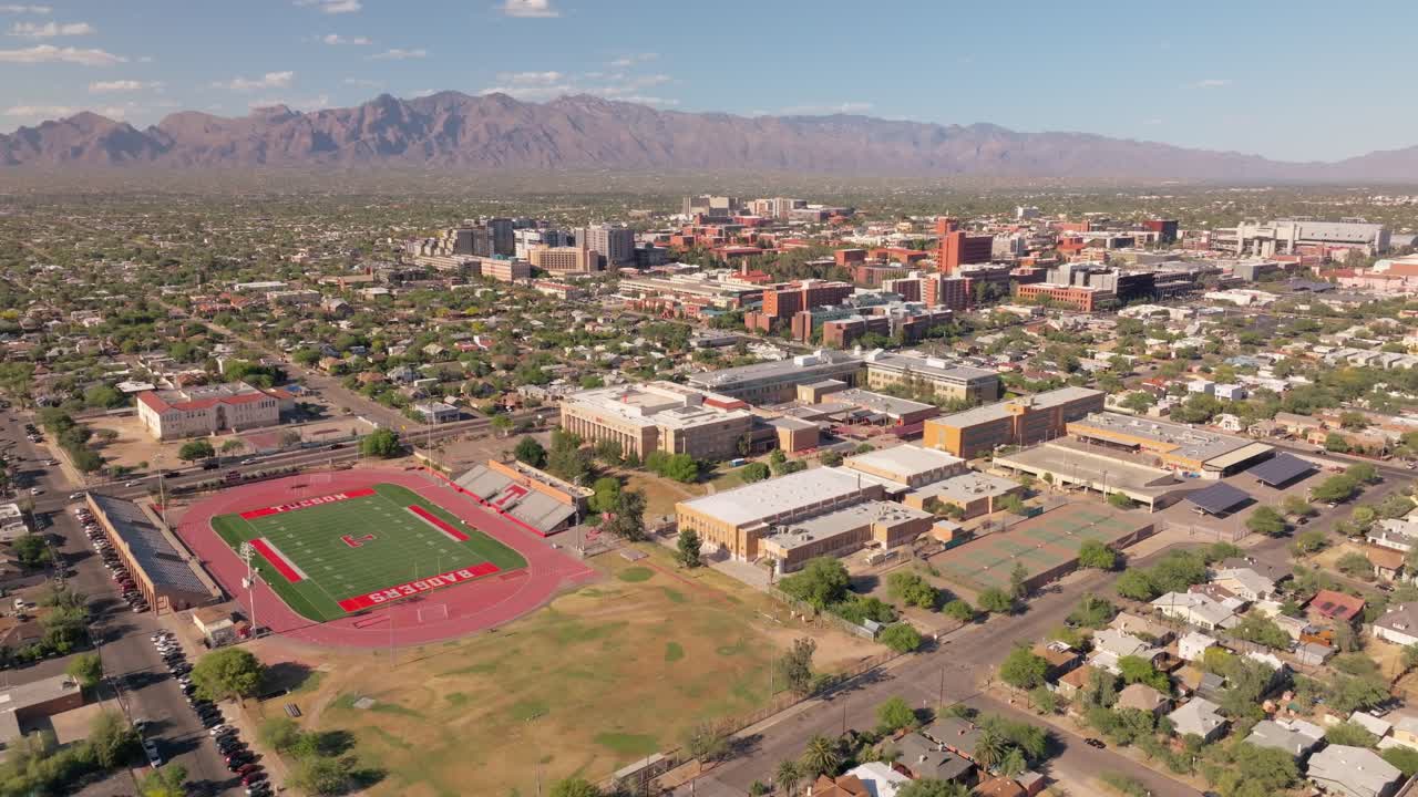 Aerial View of Tucson, Arizona with Football Field and Mountains