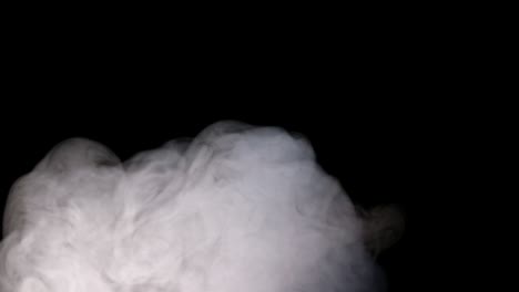 white water vapour on a black background