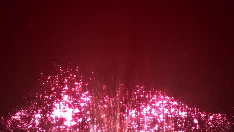 pink sparkling particles on dark background