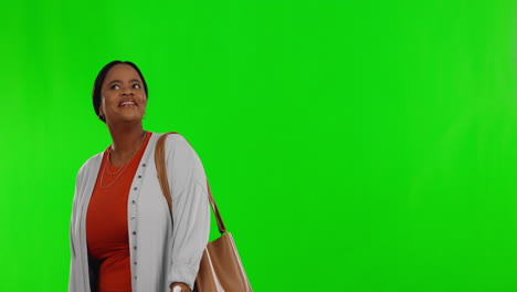 Looking,-happy-and-a-black-woman-on-a-green-screen