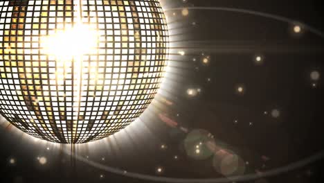 Animation-of-spinning-disco-ball-and-glowing-lights