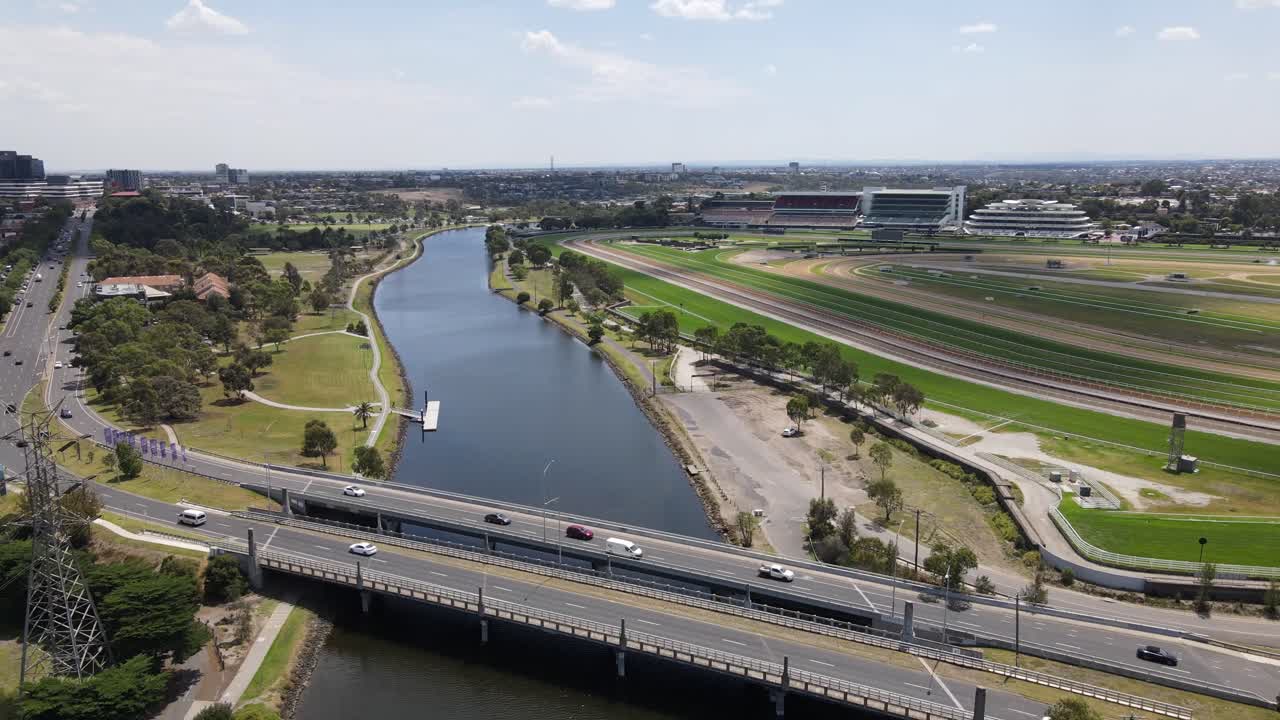 Aerial drone above river, showcasing Flemington Racecourse, Melbourne