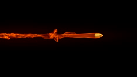 animación de una bala voladora con rastro de fuego en fondo negro