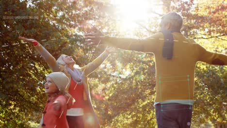 animation of white lines over happy family in autumn park