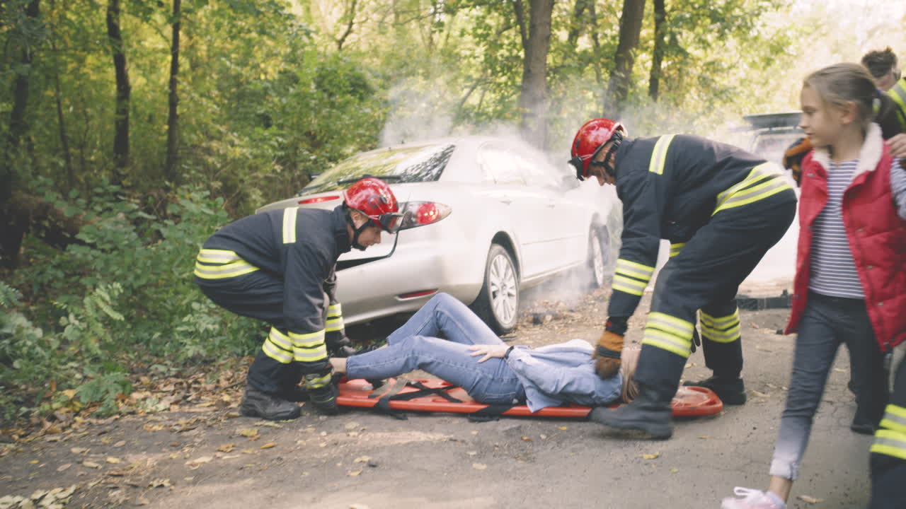 Firefighters Rescue Victims of a Car Accident