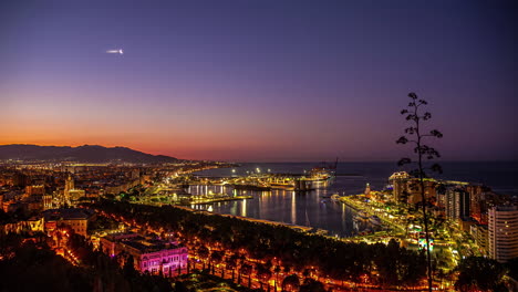 Malaga,-Spain,-is-highlighted-in-a-breathtaking-timelapse-where-the-city's-stunning-view,-the-captivating-sea,-and-its-well-planned-infrastructure-all-come-together-to-create-a-picturesque-landscape