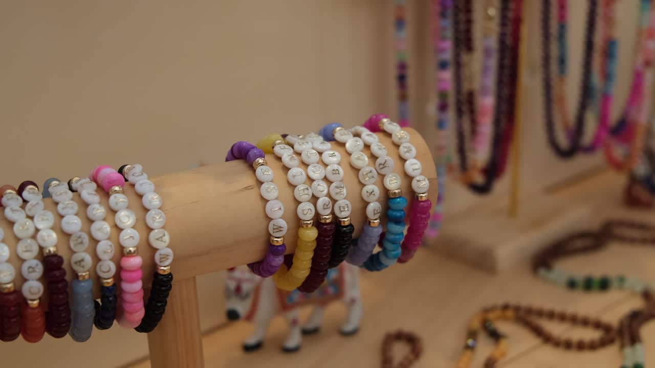 A vast choice of colourful bracelets and jewellery on display at shop.