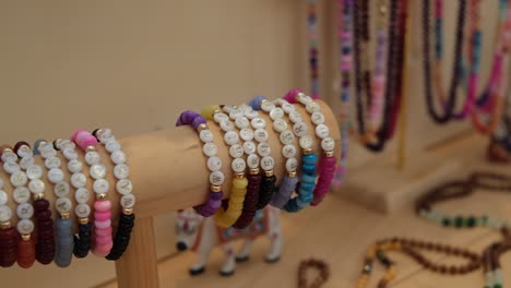 a vast choice of colourful bracelets and jewellery on display at shop.
