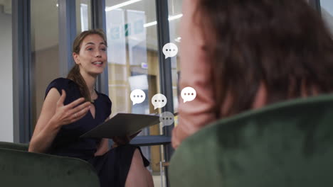 animation of speech bubbles over diverse business people discussing work