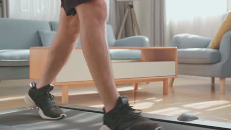 man walking in a living room