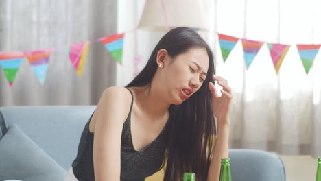 upset young woman at a party