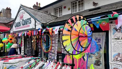 vibrant wind spinner outside a crafts shop