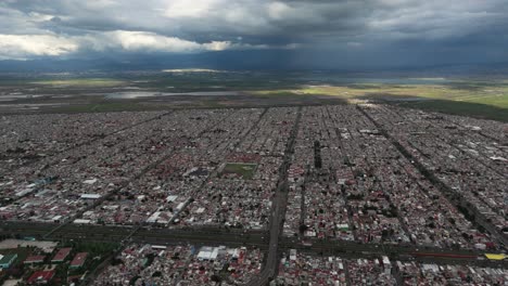 drone's aerial view of northern cdmx on a cloudy afternoon