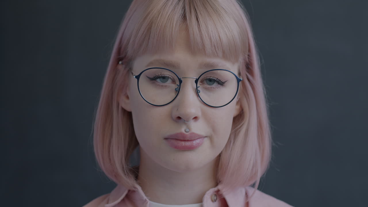 Woman with Pink Hair and Glasses