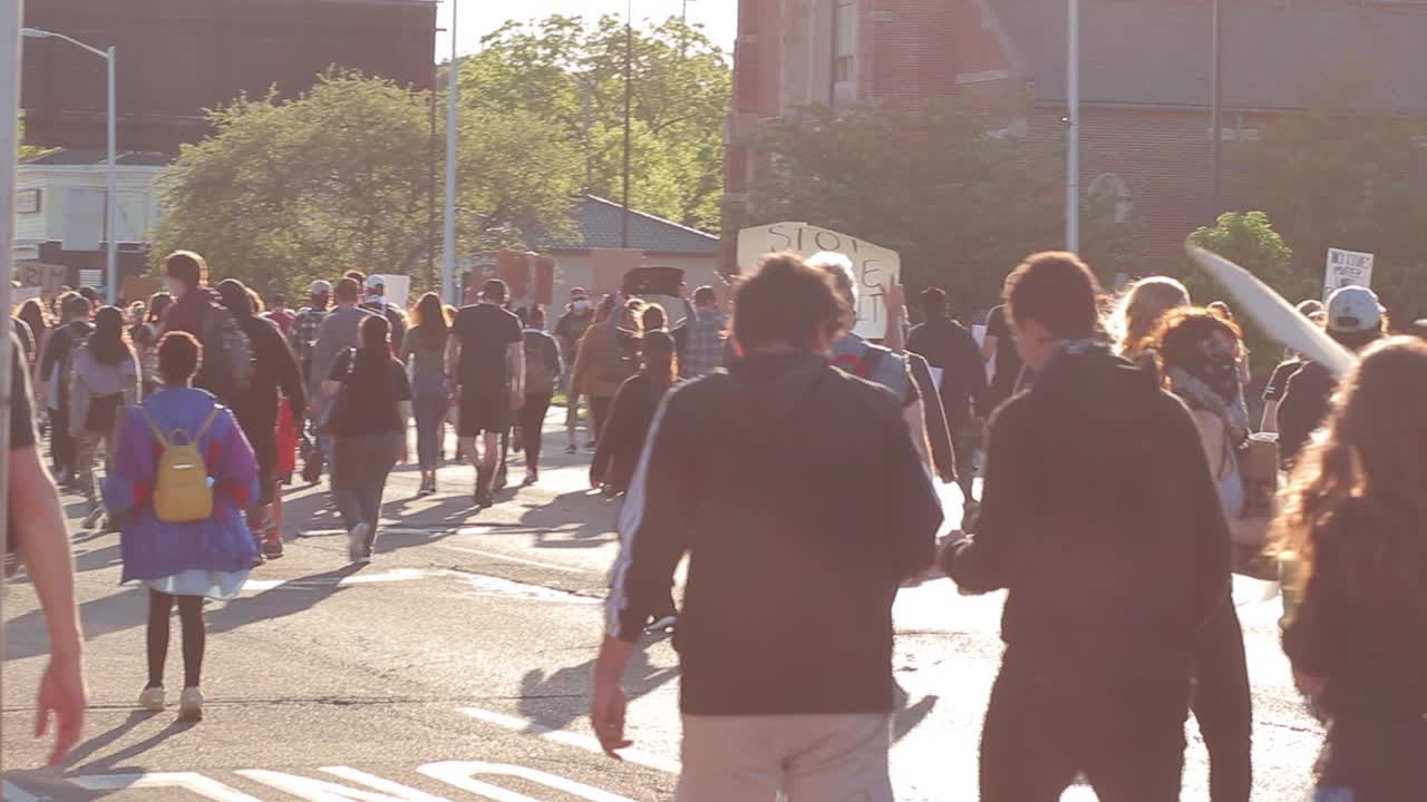 Marching shot with lens flare: BLM protest march in Kalamazoo, MI