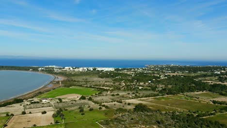 drone shot panning over fields on formentera