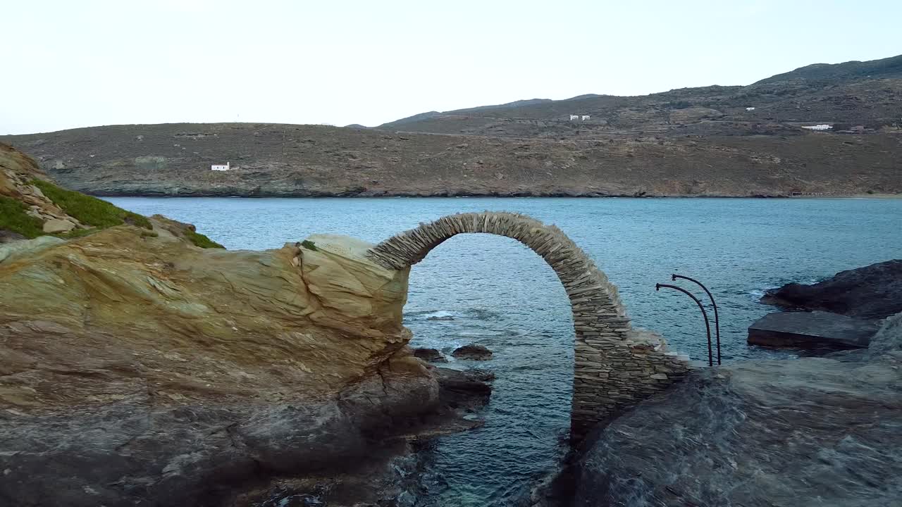 Flyby at Venetian Ancient Stone Arched Kamara Bridge Lower Castle in Chora of Andros, Greece