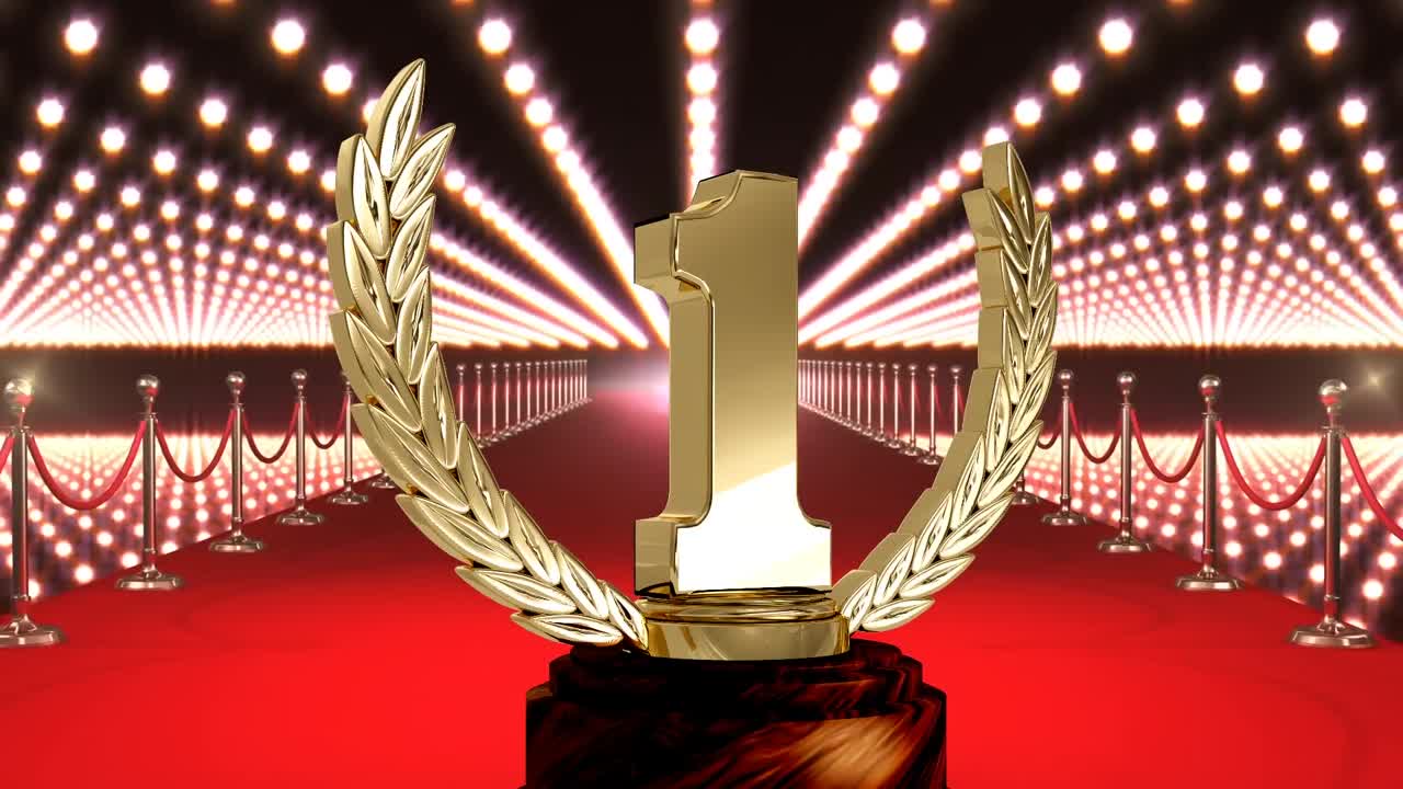 Animation of first place award trophy at floodlit, red carpet winners' prize giving ceremony