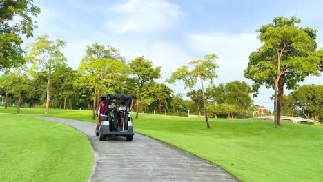 golf cart travels scenic path in bangkok