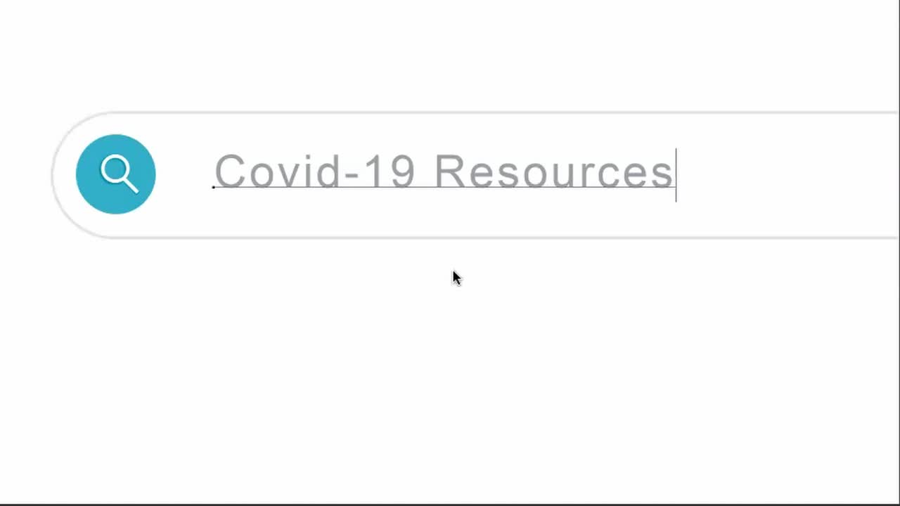 Typing Covid-19 Resources In The Search Bar Using A Desktop With Internet Connection - close up