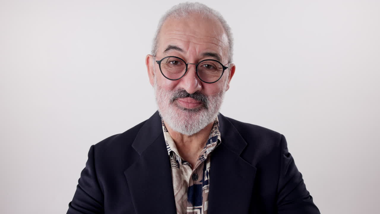 Portrait of an elderly man with glasses