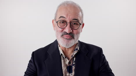 portrait of an elderly man with glasses