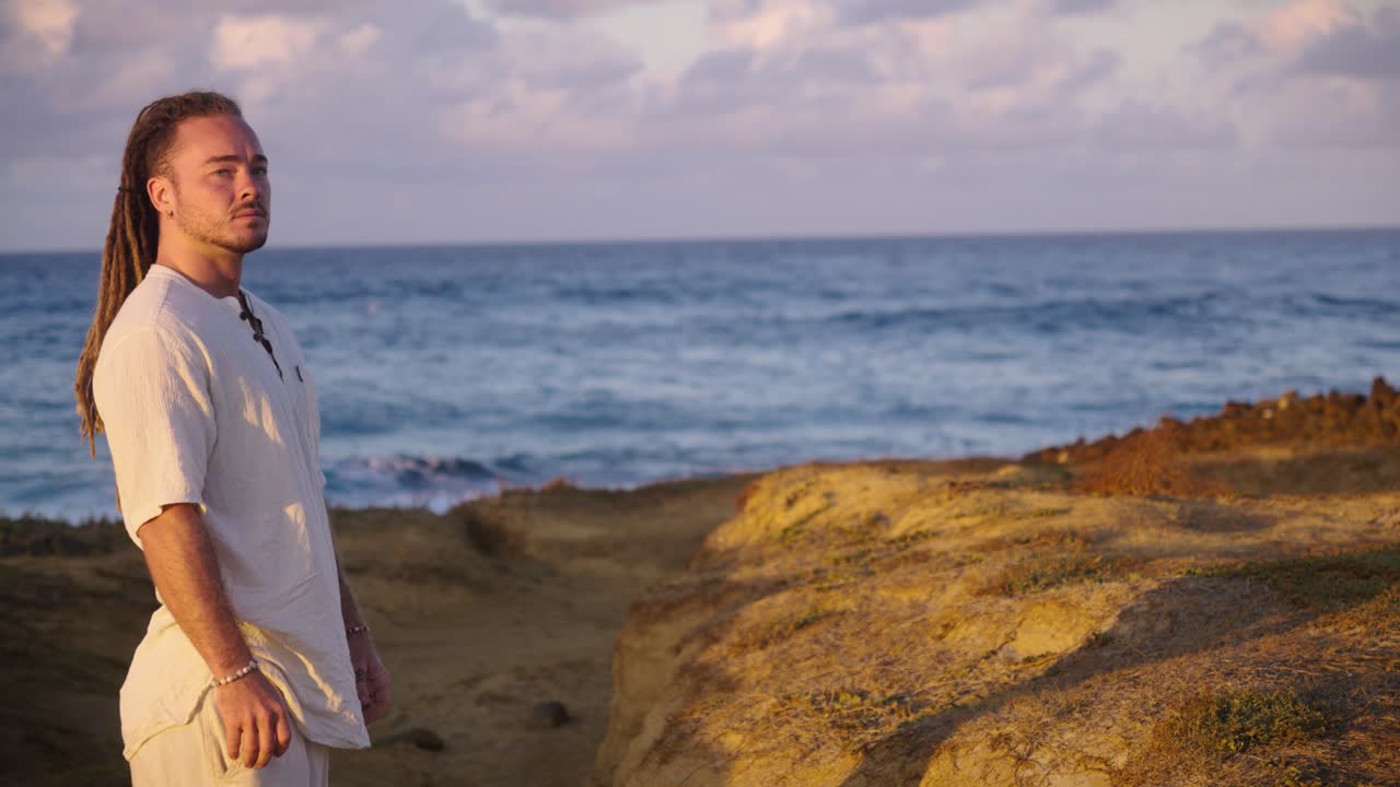 Man with Dreadlocks at the Beach