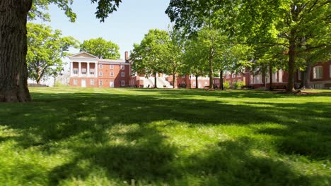 University-of-Delaware-building-low-cinematic-drone-sideways-shot