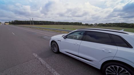 vinnitsa, ukraine - september 2019: presentation of a white audi e-tron, compact luxury crossover suv. modern new cars for sale