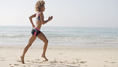 Woman-Running-On-The-Beach