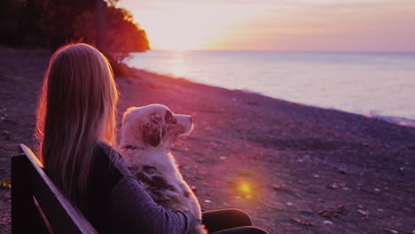 a young woman plays with a dog 4