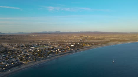 aerial pan over desert city peninsula coastal town bahia asuncion mexico