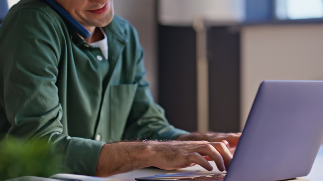 Sale specialist calling mobile phone at company workplace closeup. Smiling man