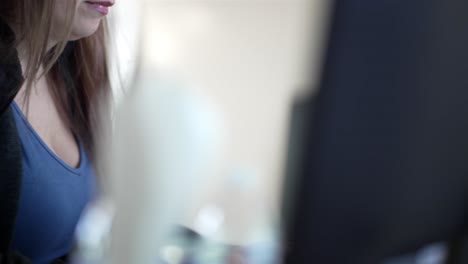 confident businesswoman working on laptop in stylish home office
