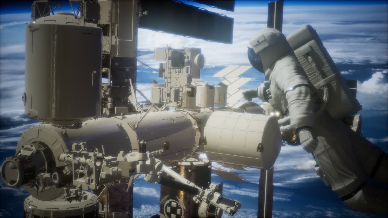 地球上空の宇宙空間に浮かぶ国際宇宙ステーションと宇宙飛行士