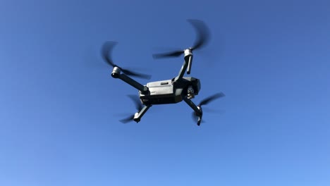 agriculture. innovations. smart technological drone analyzing field flying against sunny sunset sky landscape. digital device