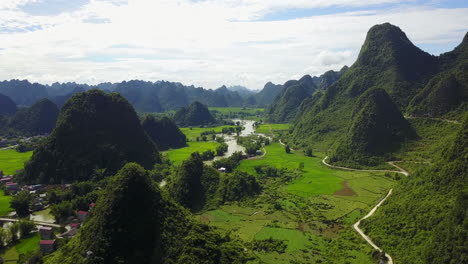 scenic aerial view of lush valleys and rivers at ban gioc waterfalls