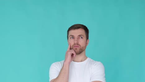 pensive man looking away in slow motion in studio portrait of a caucasian man pensive man looking away in slow motion in studio portrait of a caucasian man