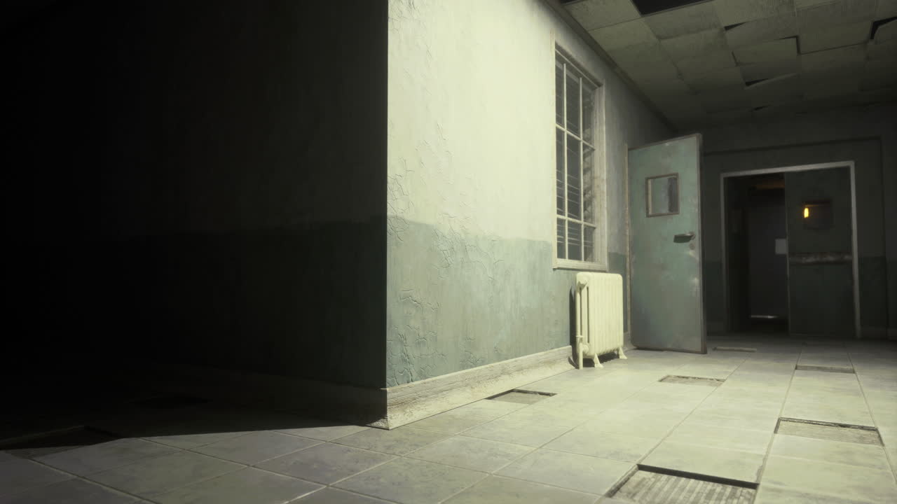 Abandoned interior of an old building with minimal lighting and shadows