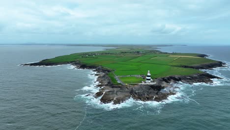 wexford epic locations drone orbit from far out at sea of hook head peninsula and lighthouse stunning view ireland landscapes