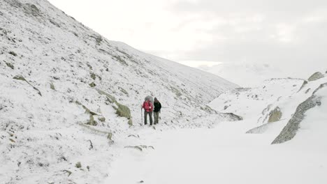 backpackers on the larke pass in nepal, 5100m altitude. manaslu circuit trek.