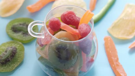 assorted dried fruits in a clear cup