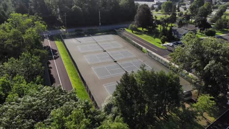 4K-Drone-Shot-Pan-over-beautiful-Tennis-Courts