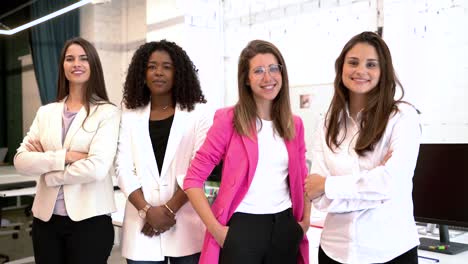 multiracial women standing in office